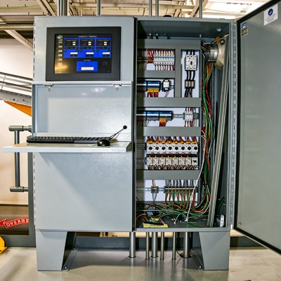 3-phase AC voltage transducer connected to a PLC control system.