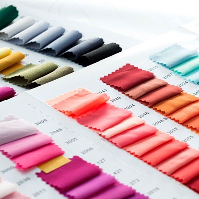 Diffuse reflective photoelectric sensor for fabric color inspection