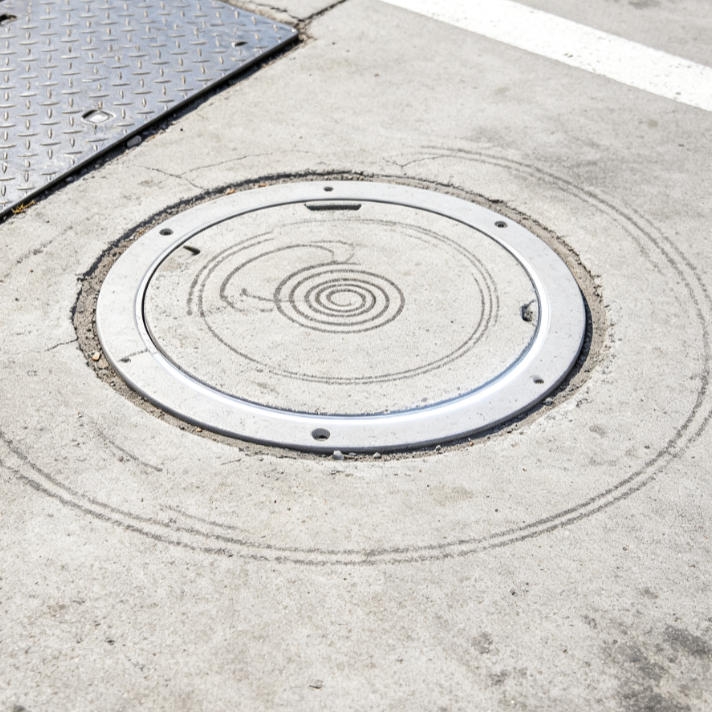 Geomagnetic Detection Sensor Embedded in a Parking Space Lock System to Sense Vehicle Arrival and Trigger Automatic Lock Raise/Lower Operation.