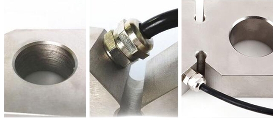 Tension load cell for crane feature