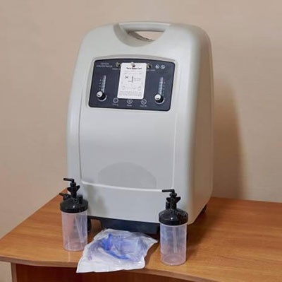 Ultrasonic gas flow sensor for oxygen concentrator