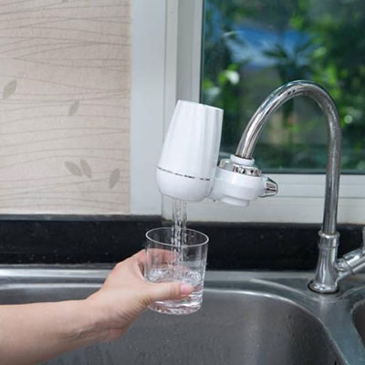 Water flow switch for self-priming water purifier